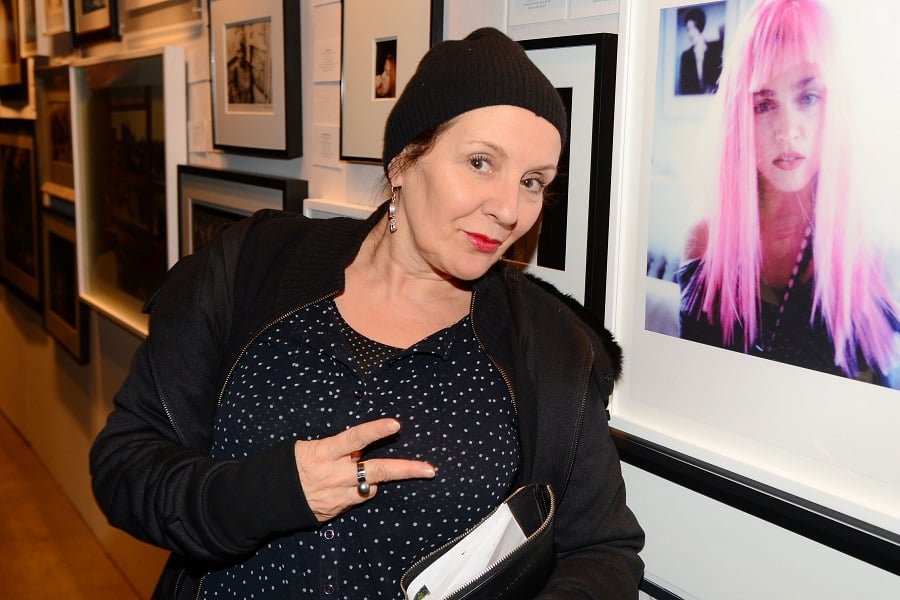 Artist and fashion designer Maripol throws up a peace sign at the Photographers For Friends Benefit. Photo: Patrick McMullan/PatrickMcMullan.com