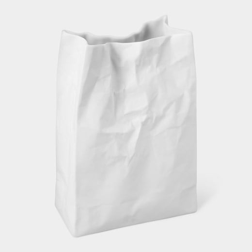 Like so many things dubbed "dumpster chic", this this looks like a crumpled bag, but is really a lovely porcelain vase. Gotcha! Source: MoMA Design Store