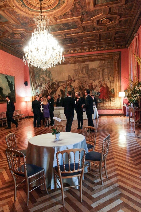 Guests mingle in the decadent rooms of the Consulate.