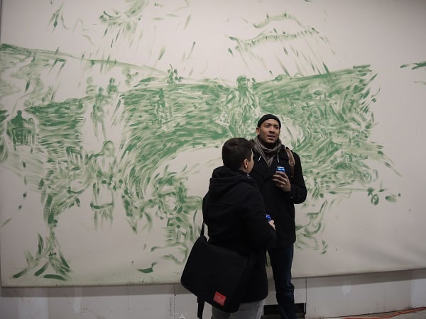 Guests in front of work by Laurie Anderson at the 2014 Brucennial.