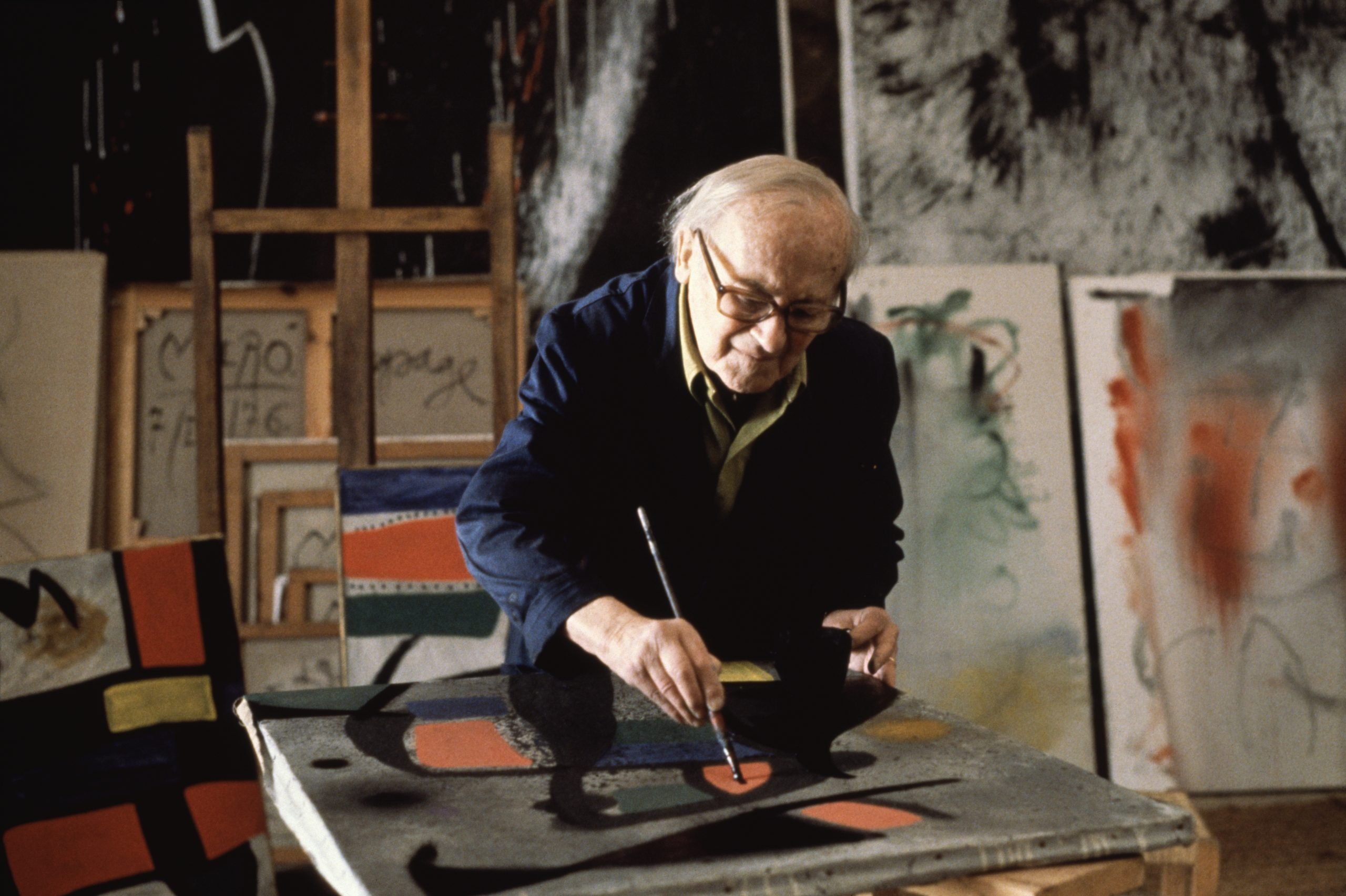 Surrealist painter Joan Miró in his studio. Photo by Alain Dejean/Sygma via Getty Images.