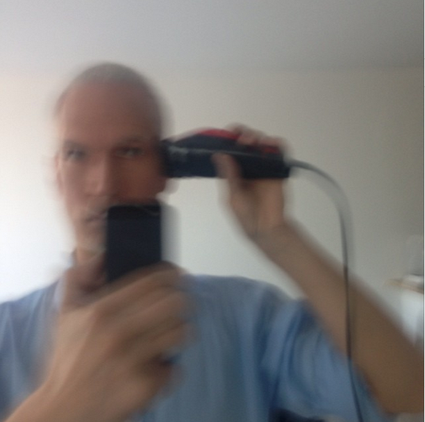 Klaus Biesenbach's mid-shave selfie. 
