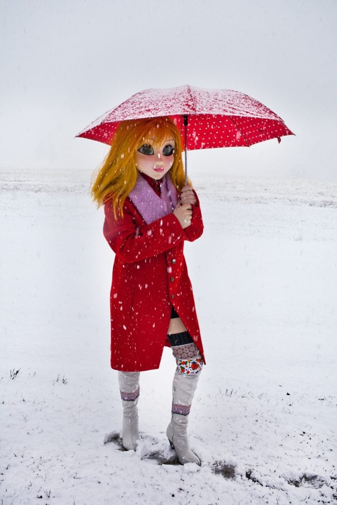 Laurie Simmons, Yellow Hair/Red Coat/Umbrella/Snow (2014). Courtesy of the artist and Salon 94.