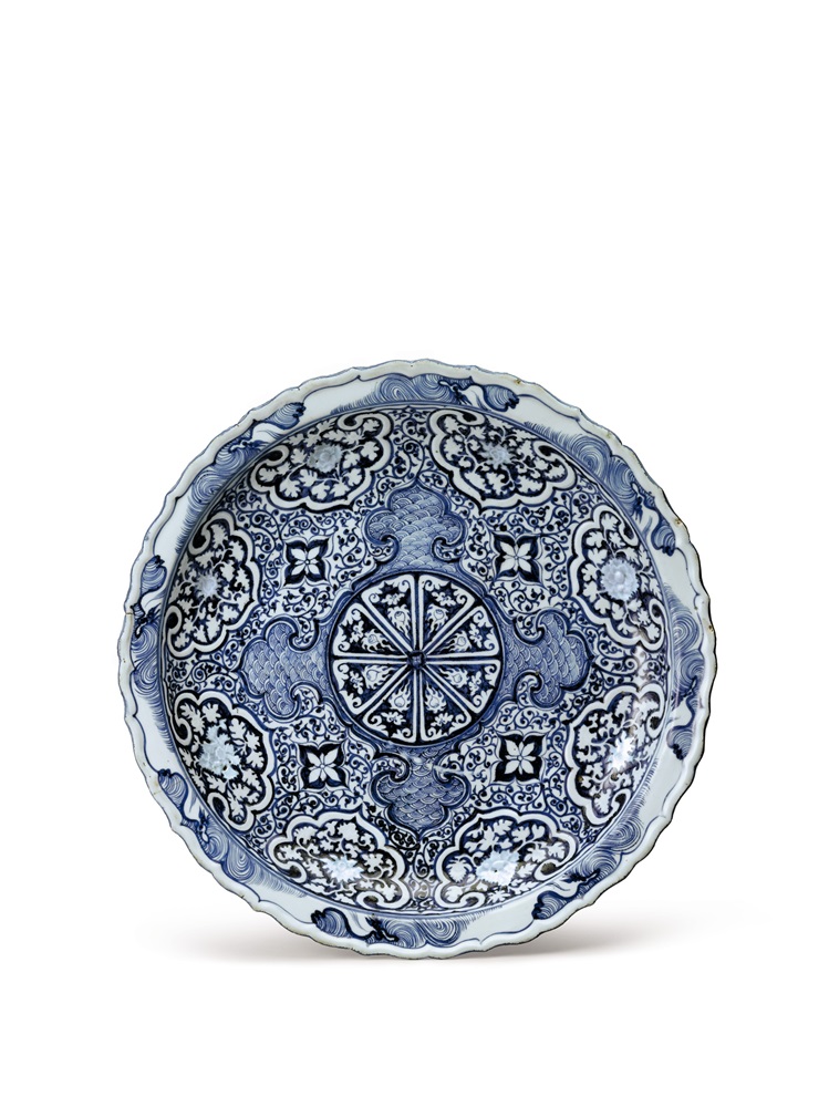 A rare molded blue and white barbed rim dish, Yuan dynasty is expected to sell for US$200,000 to 300,000. Photo: Sotheby's