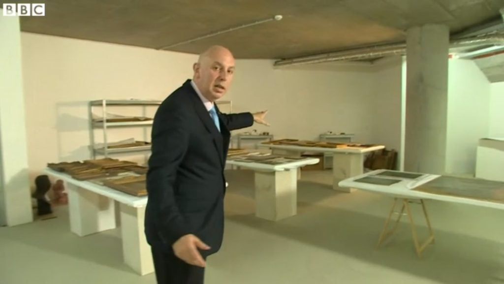 Video still of BBC correspondent Stephen Evans visiting the secret storage facility that currently houses the Cornelius Gurlitt art collection.