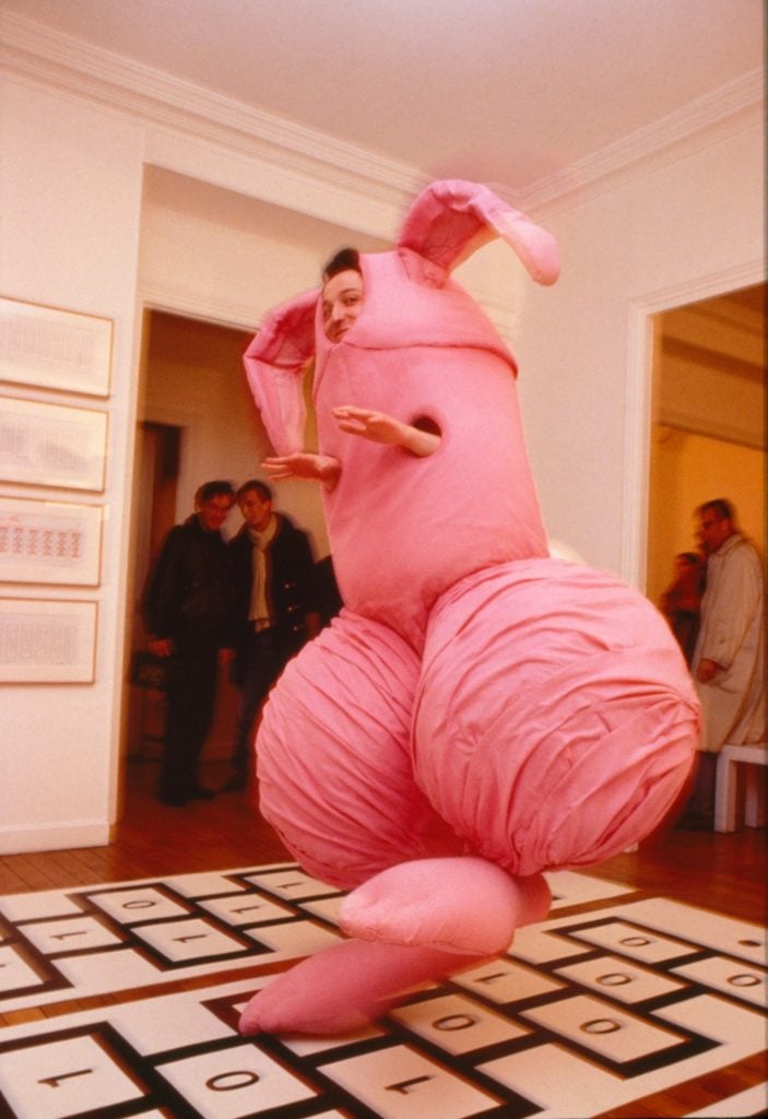 Emmanuel Perrotin (dressed in a giant pink penis costume with bunny ears) participating in a 1995 exhibition by Maurizio Cattelan at the Perrotin gallery in Paris.