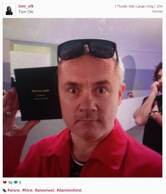 Damien Hirst with his copy of Weiwei-isms.