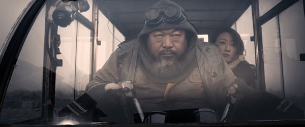 Ai Wei Wei as a smuggler in the science fiction movie The Sandstorm.