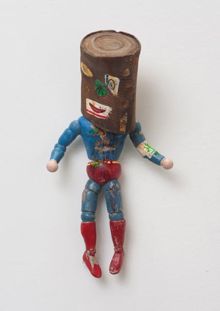 Kristen Morgin, <i>Super Can Man</i> (2013), unfired clay, paint, marker, ink, string. <br>Photo: courtesy Zach Feuer.