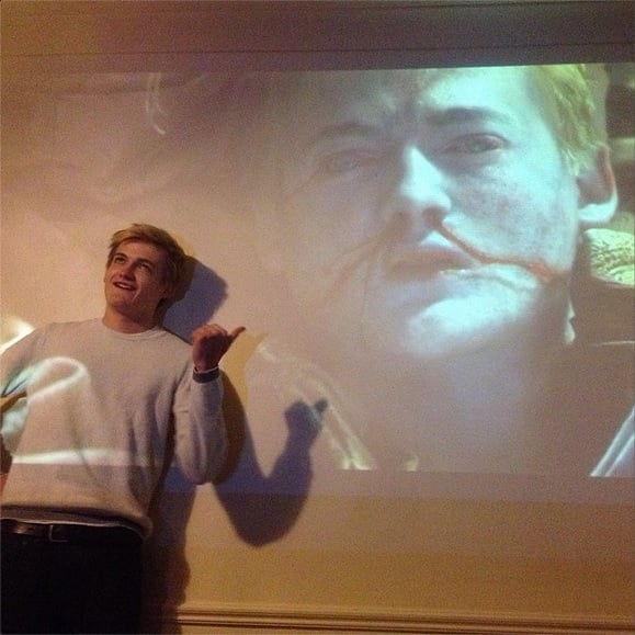 Game of Thrones star Jack Gleeson mugging in front of a projected image of King Joffrey's death. Photo: via Instagram.