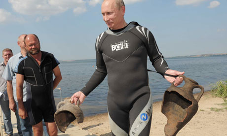 Vladimir Putin emerged from a 2011 scuba dive with two archaeological trophies. Photo: Alexei Druzhinin, courtesy the AP.