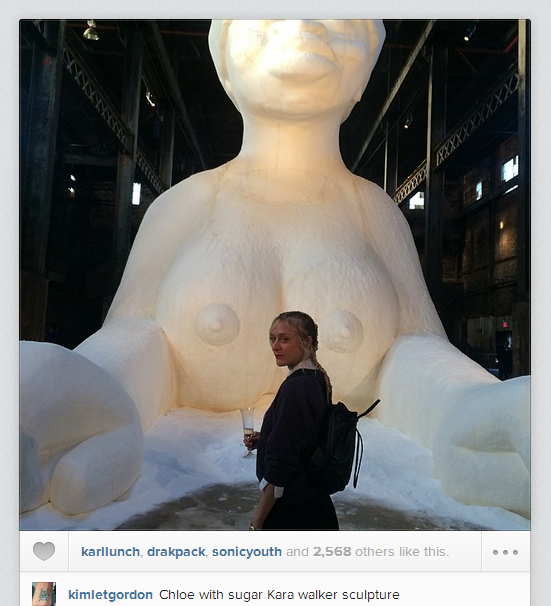 Kim Gordon photographed Chloe Sevigny at the Creative Time Gala in front of this fantastic Kara Walker sculpture.