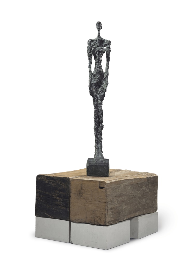 Alberto Giacometti (1901-1966) Femme de Venise IV signed and numbered 'Alberto Giacometti 2/6' (on the left side of the base); inscribed with foundry mark 'Susse Fond. Paris' (on the back of the base) bronze with dark brown and green patina and hand-painted by the artist Height: 45½ in. (115.5 cm.) Conceived in 1956 and cast in 1957  est. $10-18 million