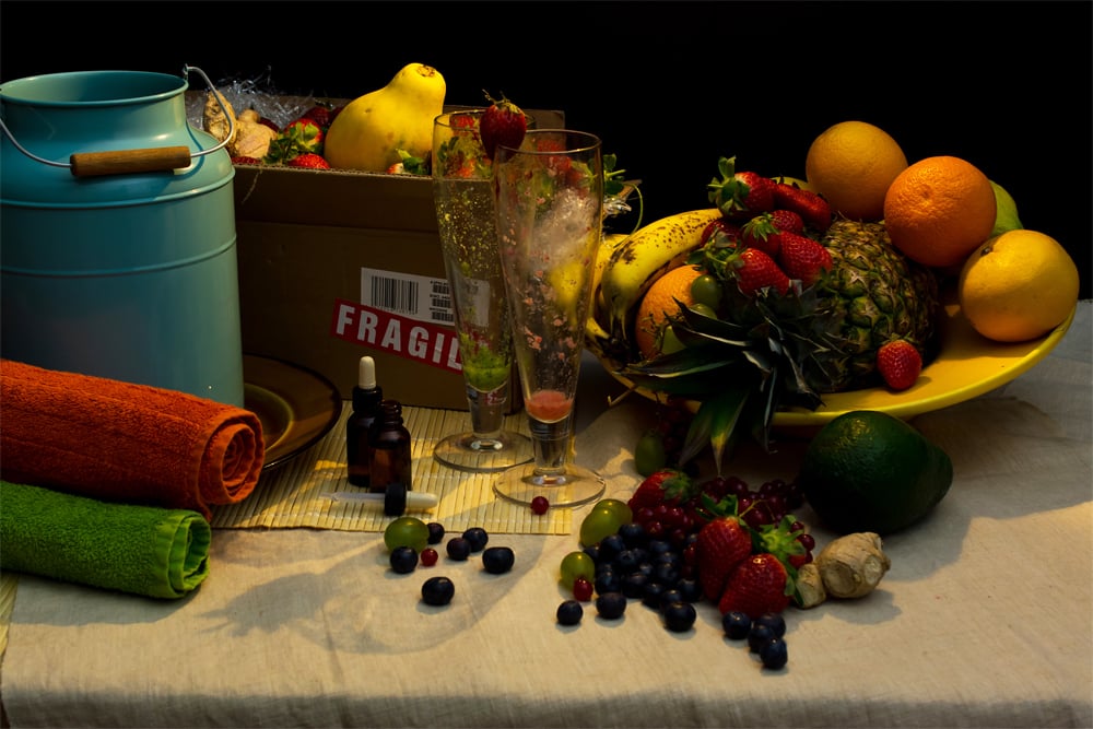 Dan Bannino, <em>Simon Cowell, "Life enhancing"</em>, airfreight-shipped box full of pineapples, strawberries, grapes, cranberries, blueberries, oranges, mangos, and avocados, made into smoothies, plus a tank of milk for bathing in, and vitamins. Photo: courtesy the artist. 