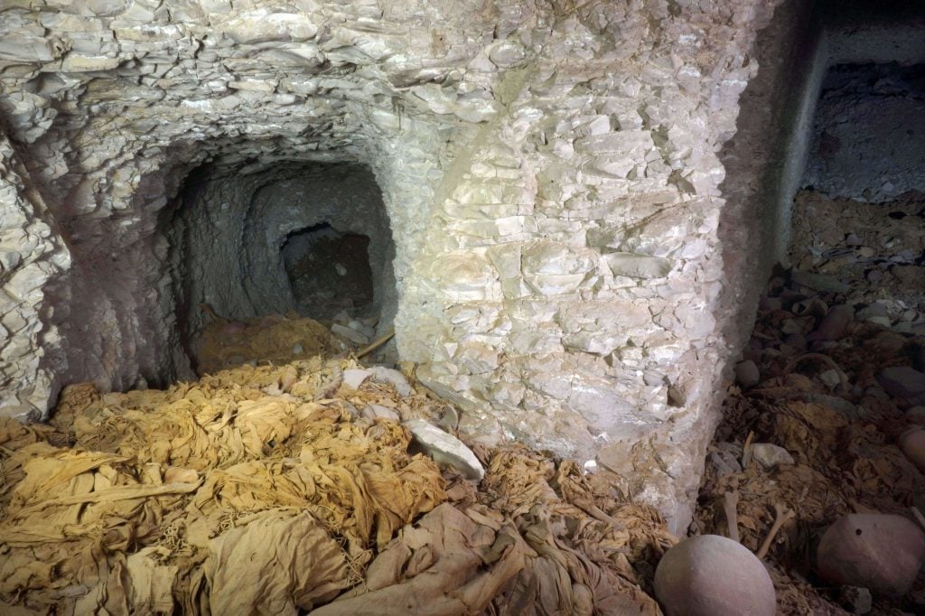 Human remains litter the floor of the 4,000-year-old tomb's inner chamber. Photo courtesy of the Egypt Antiquities Ministry.