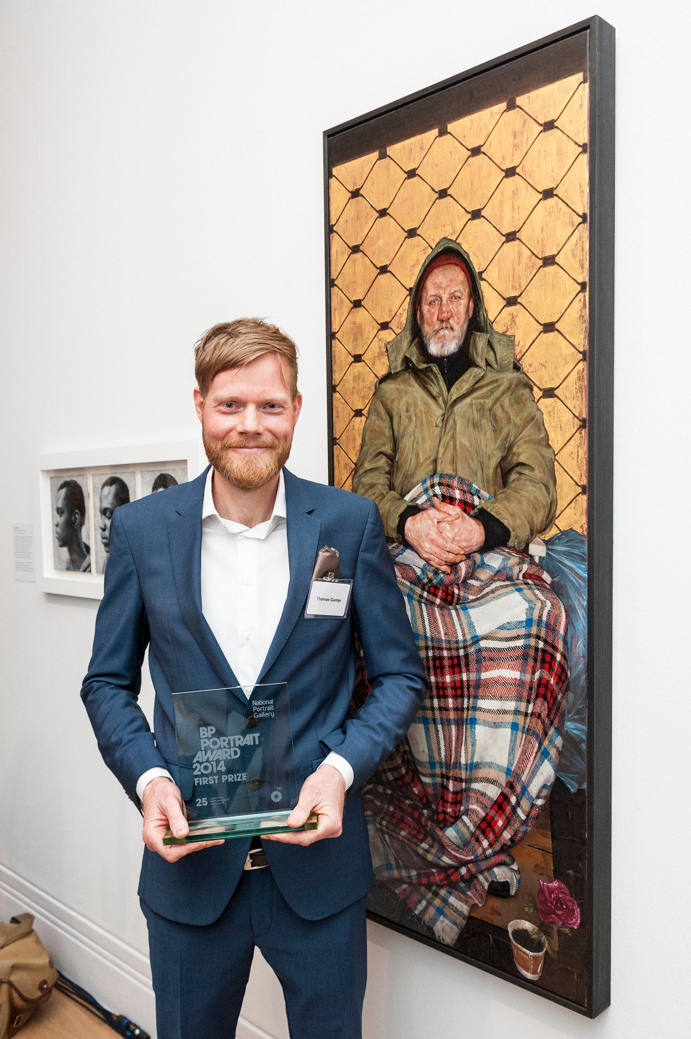 Thomas Ganter with his portrait, Man with a Plaid Blanket