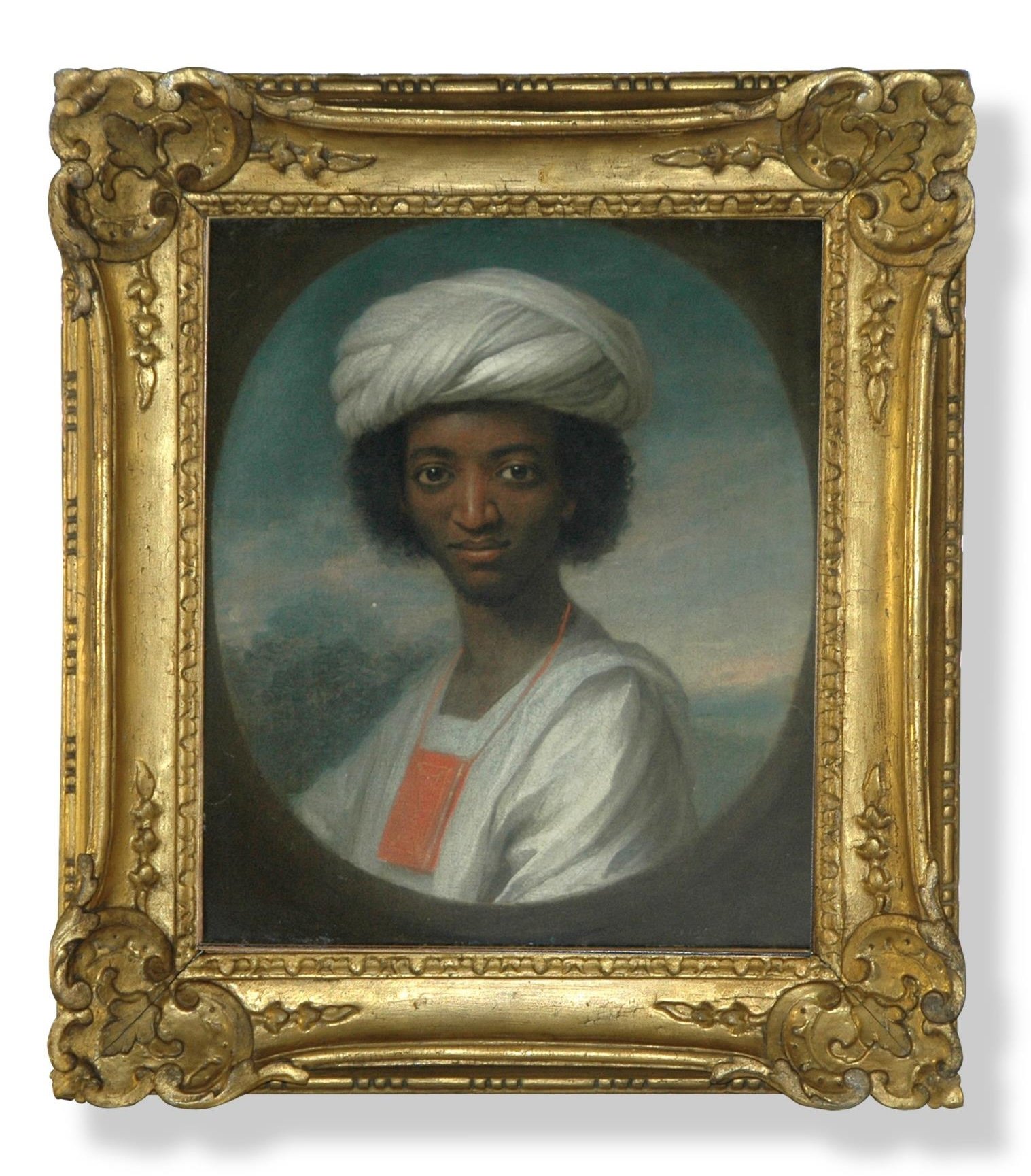 An 18th-century portrait in an ornate frame of a young Black man in a white turban and robe, with a rectangular red leather pouch, likely for holding the Koran, hanging around his neck.