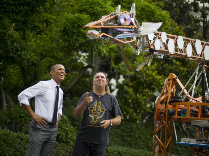 President Barack Obama with  "The Electric Giraffe Project" at the first White House Maker Faire. Photo: Associated Press, via Business Insider.