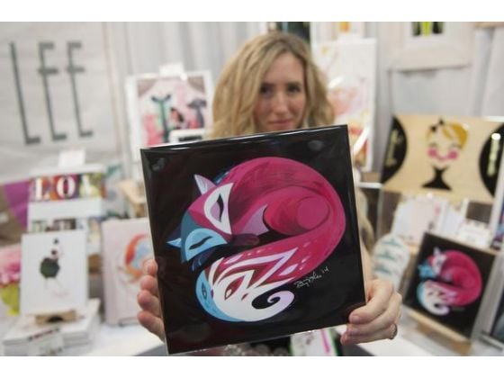 Brittney Lee in her booth at the San Diego Comic-Con International. Photo: Miguel Vasconcellos, <em>Orange County Register</em>.