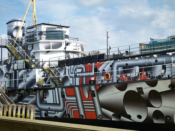 Tobias Rehberger and Carlos Cruz-Diez have adorned vessels in London and Liverpool with their take on dazzle camouflage, used extensively on British warships during WWI. Tobias Rehberger, Dazzle Ship, 2014 Photo: Stephen White