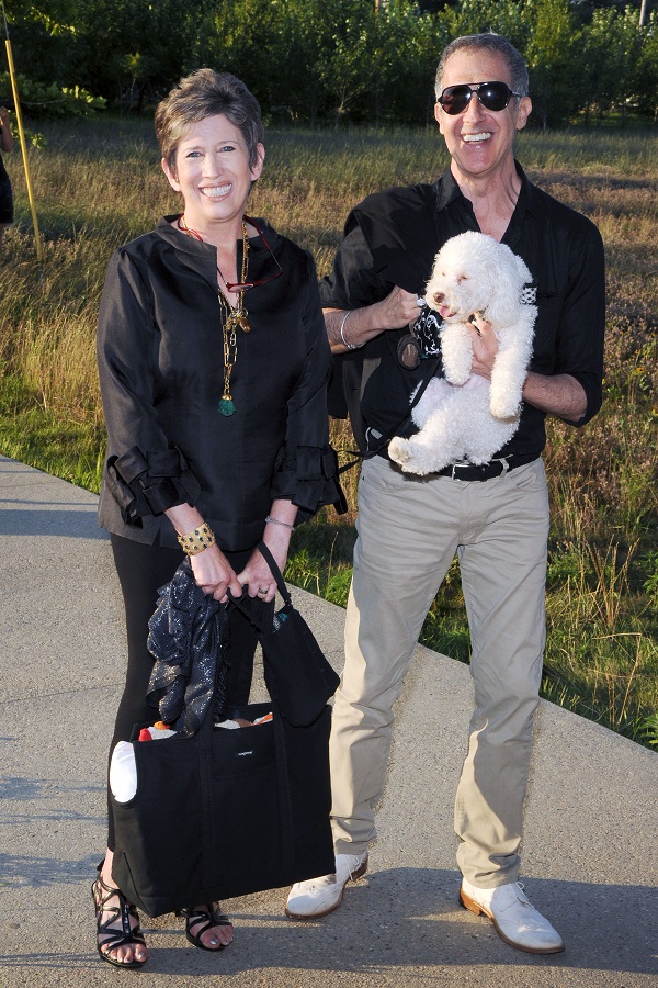 Beth Rudin DeWoody, David Croland, and a pampered pup named Rooz attend the Parrish Art Museum Midsummer Party. Photo: Owen Hoffmann/PatrickMcMullan.com.