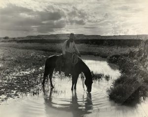 Erwin E. Smith, "Frank Smith, Watering His Horse" (1909)