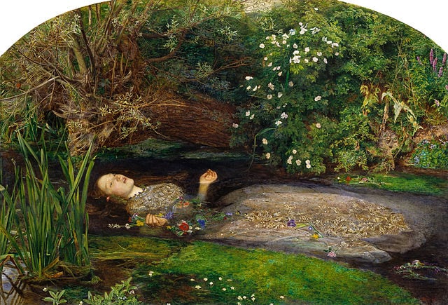A woman lies submerged in water surrounded by flowers in John Everett Millais' painting, Ophelia.