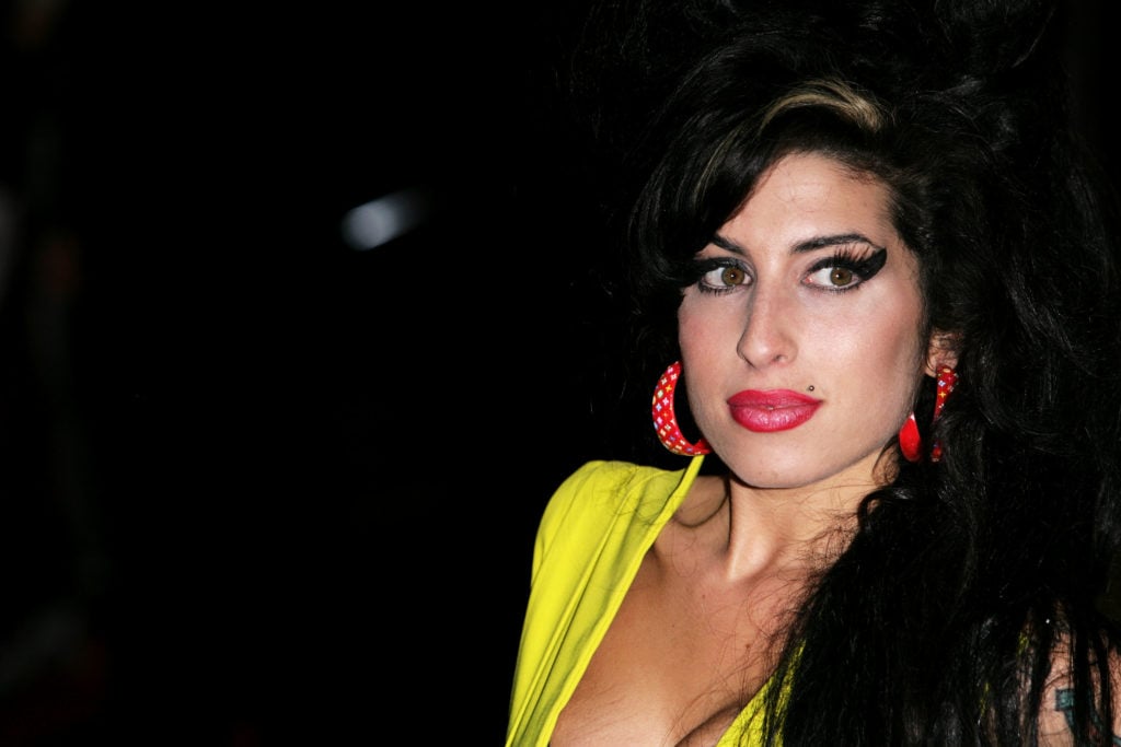 Singer Amy Winehouse arrives at the BRIT Awards 2007 in London. Photo by Gareth Cattermole/Getty Images.