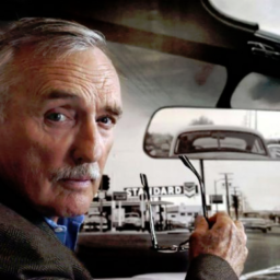 Sean Hiller, "Dennis Hopper with Billboard Painting of Double Standard" (2006)