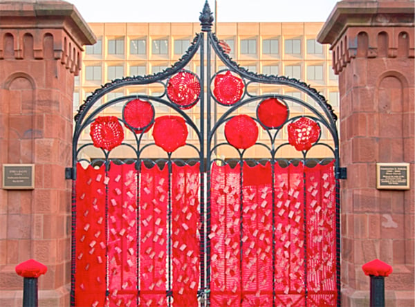 Yarn bombing the Smithsonian Castle gates for “Perspectives: Chiharu Shiota.