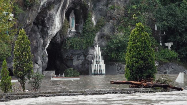 Flooding at Lourdes in October 2013. Photo: Bob Edme, courtesy AP Photo.