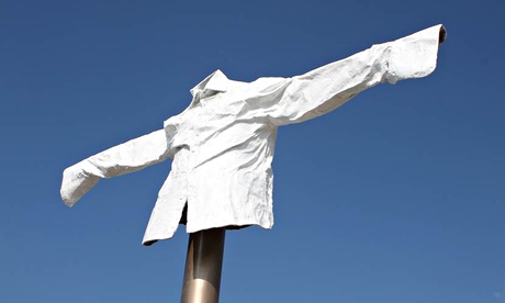 A bronze sculpture of a crucified formal shirt in Beth Cullen's 