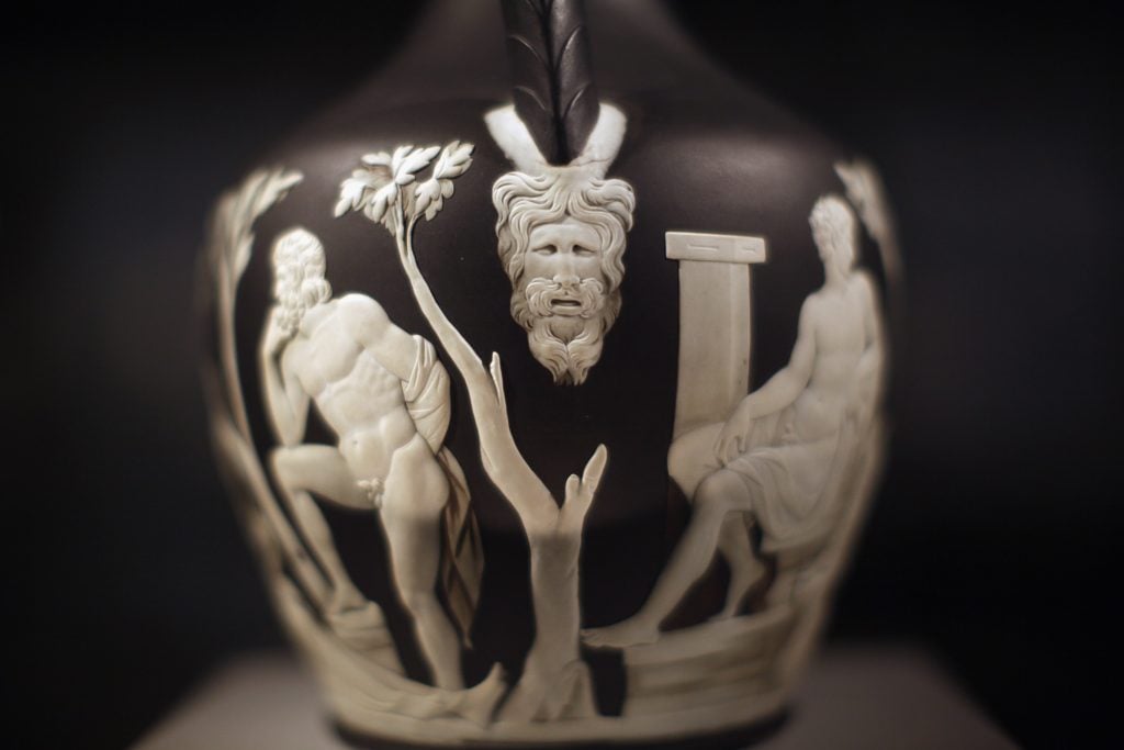 A detail of the Portland Vase, one of Wedgwood's greatest works, on display at the Wedgwood Museum on February 16, 2012 in Stoke-On-Trent, England. It is a copy of a black Roman cameo glass vase with white figures in scenes from mythology.