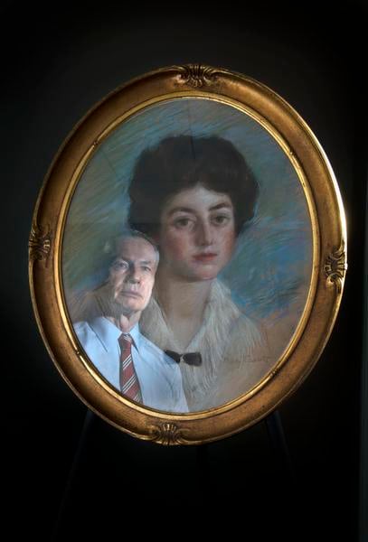Detective Don Hrycyk , LAPD Art Theft Detail, reflected gazes at a fake Mary Cassatt painting Portrait of Miss Saltonstall at the Los Angeles Police Department in downtown Los Angeles. Courtesy Ed Crisostomo/the Los Angeles Register.