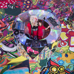 assume vivid astro focus's roller disco installation at Faena Art Center with Lady Bunny and curator Ximena Caminos. Photo: Jorge Miño.