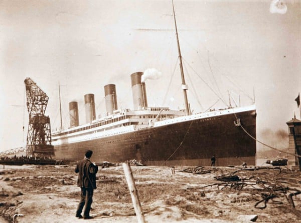 A curious onlooker watches the Titanic pass. Photo courtesy of the National Museums Northern Ireland.