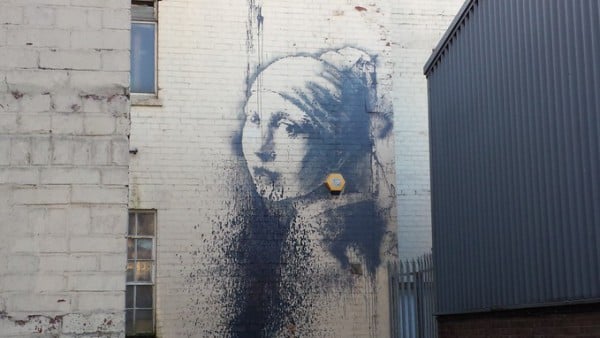 On Tuesday an unknown vandal splattered part of the mural in black paint Photo:  ITV News West Country