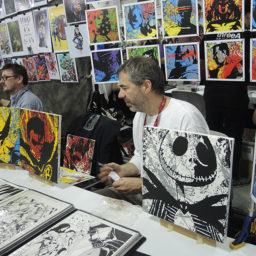 Comic artist Jim Calafiore displays his work at New York Comic Con. Photo: Sarah Cascone.