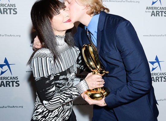 David Hallberg kisses Roselee Goldberg after receiving the Bell Family Foundation Young Artist Award at the Americans for the Arts 2014 National Arts Awards Benefit. Photo: Joe Schildhorn, courtesy BFA.