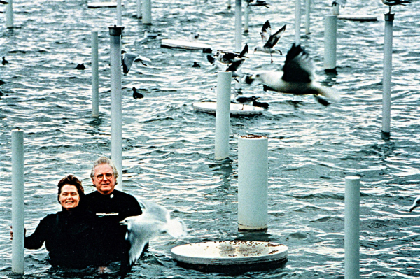 Frances Bagley and Tom Orr with their Dallas public art installation, <em>White Rock Lake Wildlife Water Theater</em> (2001).