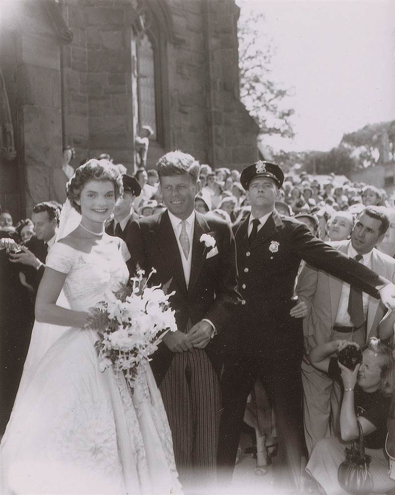 John F. Kennedy and Jacqueline Bouvier Kennedy leave the church at their 1953 wedding. Photo: courtesy RR Auction, Boston.