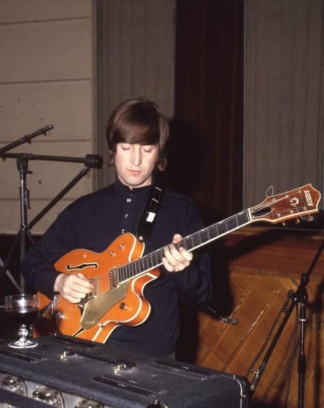 John Lennon playing the Gretsch 6120 at a recording session. Photo: Beatles Photo Library via Tracks Auctions