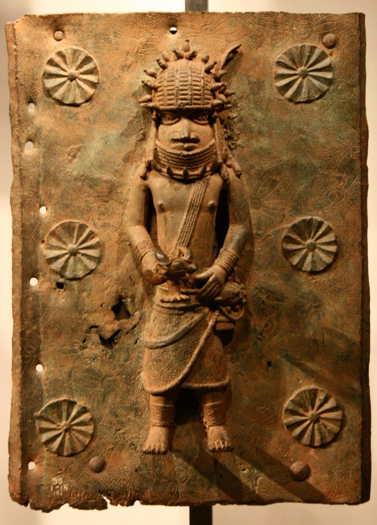 A Benin Bronze plaque in the British Museum, London, collection. Photo by Michel Wal, GNU Free Documentation License, Creative Commons Attribution-Share Alike 3.0 Unported, 2.5 Generic, 2.0 Generic, and 1.0 Generic license.