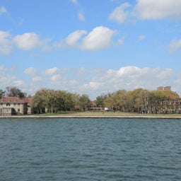 The hospital on Ellis Island as seen from the ferry. Photo: Sarah Cascone.