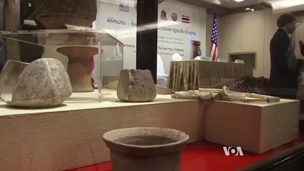 Some of the looted pottery vessels that the US government has returned to Thailand Photo via: Voice of America