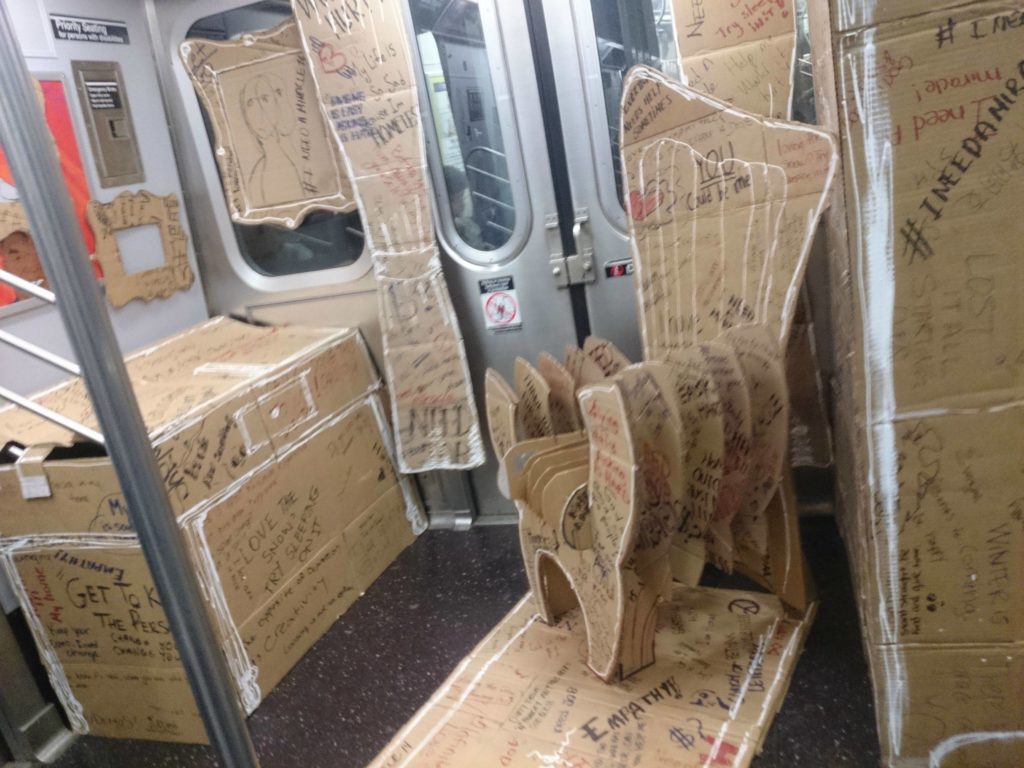 Cardboard studio apartment in a MTA subway yesterday
