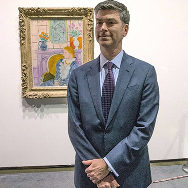 Chris Marinello in front of Henri Matisse’s Woman in Blue in Front of a Fireplace, stolen from Paul Rosenberg by Nazis but now returned to his heirs by a Norwegian museum thanks to Marinello's intervention. Photo: Christopher Marinello.
