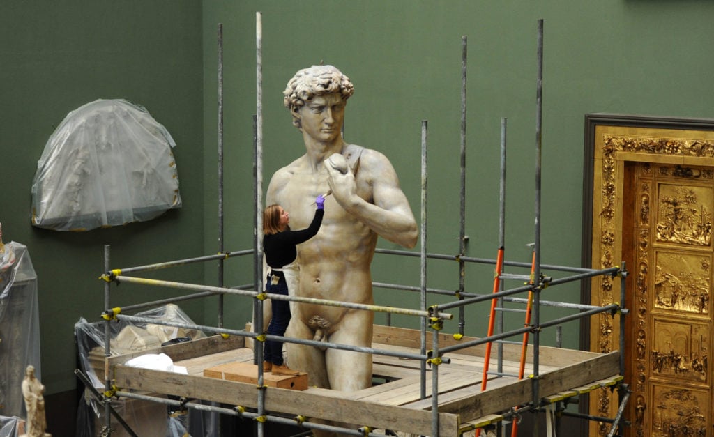 Queen Victoria's copy of Michelangelo's David being restored at London's Victoria and Albert Museum by sculpture conservator Johanna Puisto. Photo: Getty Images.