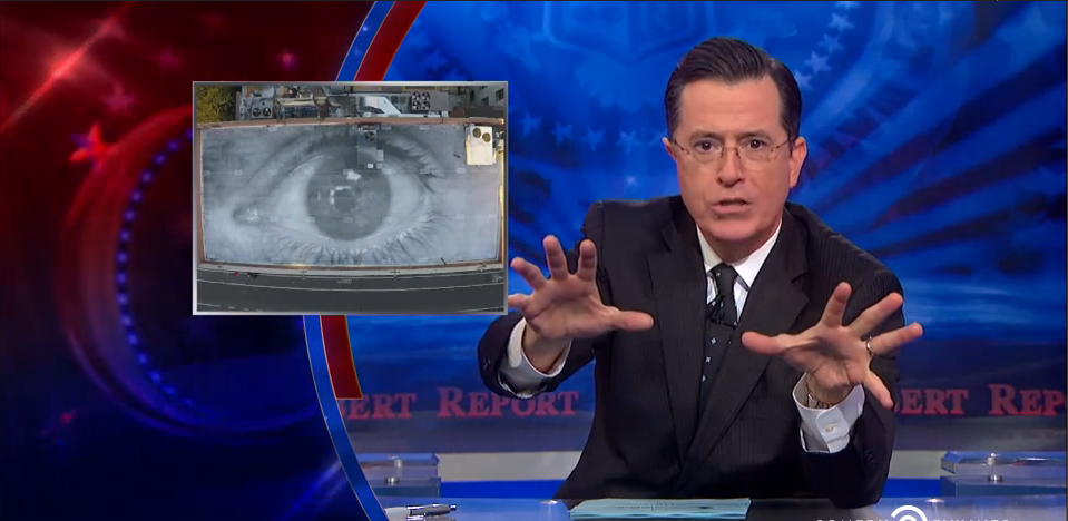 Stephen Colbert discusses JR's mural of his eye, installed on the roof of the studio where The Colbert Report was filmed. Photo: screen shot via Comedy Central.