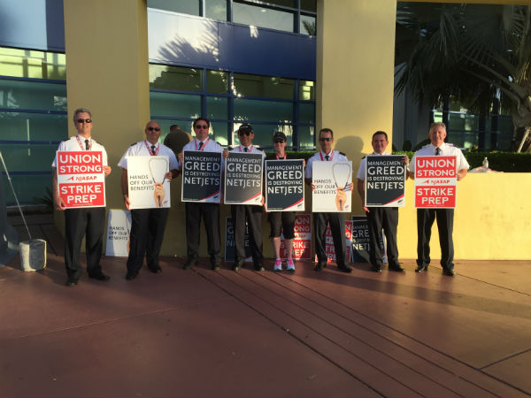 NetJets pilots protest in front of the Miami Beach Convention Center